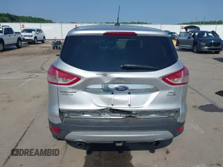 2013 Ford Escape SEL with VIN 1FMCU9H99DUA11243, listed as a IAAI auction lot 42356731 with 154,937 mi miles and . Bid and sale history available at DreamBid. Image 16.