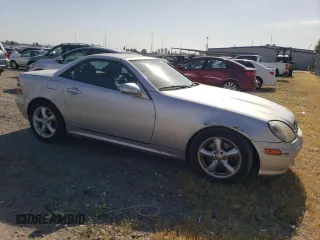 2001 Mercedes-Benz SLK-Class with VIN WDBKK65F11F178256, listed as a Copart auction lot 54979975 with 95,439 mi miles and Salvage Title. Bid and sale history available at carsss.com. Image 4.