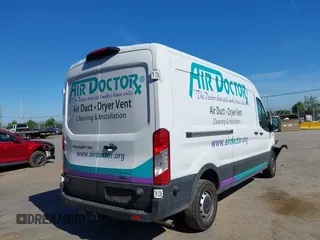2023 Ford Transit Cargo with VIN 1FTBR1C89PKC07197, listed as a IAAI auction lot 42228682 with 39,306 mi miles and . Bid and sale history available at DreamBid. Image 4.