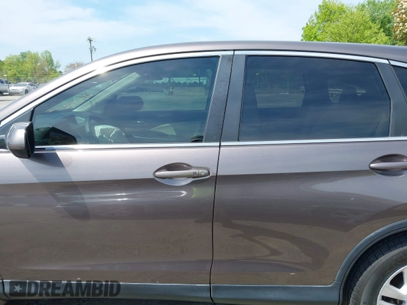 2015 Honda CR-V EX with VIN 2HKRM3H57FH521659, listed as a IAAI auction lot 41876064 with 98,420 mi miles and . Bid and sale history available at carsss.com. Image 14.