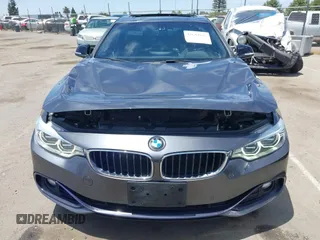 2015 BMW 4 Series 428i with VIN WBA4A5C59FG052596, listed as a IAAI auction lot 42649927 with 68,842 mi miles and . Bid and sale history available at DreamBid. Image 12.
