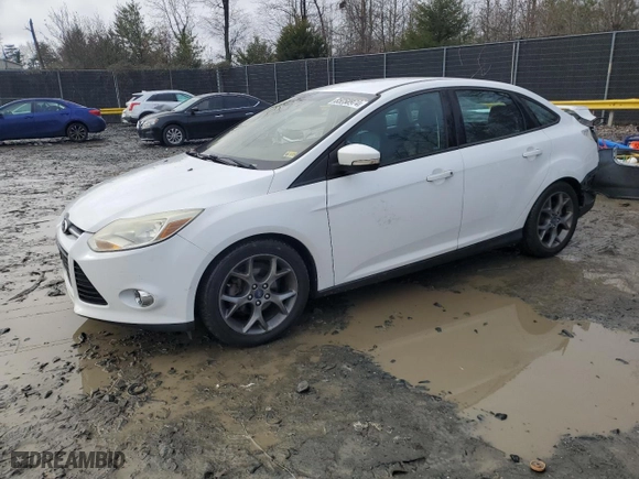 2014 Ford Focus SE with VIN 1FADP3F21EL202851, listed as a Copart auction lot 85258974 with 157,735 mi miles and Salvage Title. Bid and sale history available at carsss.com. Image 1.