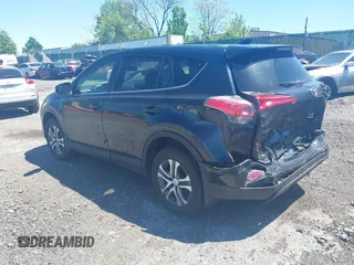 2017 Toyota RAV4 LE with VIN JTMBFREV8HJ168975, listed as a IAAI auction lot 42139354 with 91,394 mi miles and . Bid and sale history available at DreamBid. Image 3.
