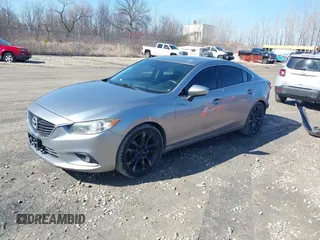 2015 Mazda 6 i Grand Touring with VIN JM1GJ1W68F1170459, listed as a IAAI auction lot 41759915 with 109,911 mi miles and . Bid and sale history available at DreamBid. Image 2.