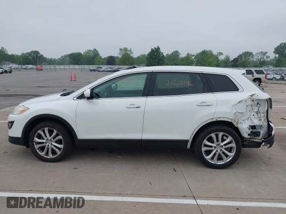 2012 Mazda CX-9 Grand Touring с VIN JM3TB2DA3C0354645, выставлен на аукционе IAAI как лот 42447164 с пробегом 212 014 миль миль и . История ставок и продаж доступна на DreamBid. Изображение 14.