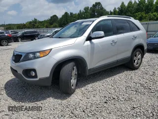 2012 Kia Sorento EX with VIN 5XYKU4A69CG288431, listed as a Copart auction lot 62986595 with 216,323 mi miles and Salvage title. Bid and sale history available at DreamBid. Image 1.