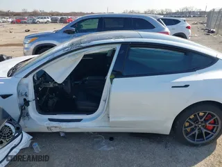 2023 Tesla Model 3 with VIN 5YJ3E1EA2PF500923, listed as a IAAI auction lot 41115550 with 1 mi miles. Bid and sale history available at carsss.com. Image 15.