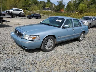 2010 Mercury Grand Marquis LS with VIN 2MEBM7FV7AX627417, listed as a Copart auction lot 71925754 with 127,918 mi miles and Salvage Title. Bid and sale history available at carsss.com. Image 1.