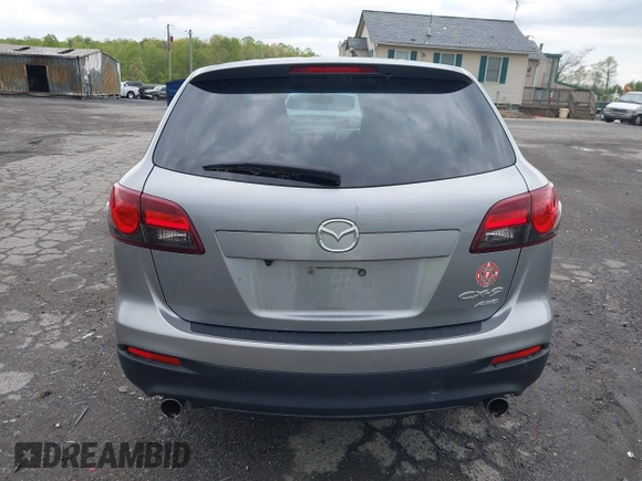 2015 Mazda CX-9 Sport with VIN JM3TB3BV2F0454770, listed as a IAAI auction lot 42009879 with 98,916 mi miles and . Bid and sale history available at carsss.com. Image 16.