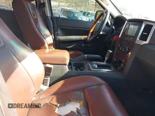 2009 Jeep Grand Cherokee with VIN 1J8HR68T39C540795, listed as a IAAI auction lot 41379112 with 236,624 mi miles and . Bid and sale history available at DreamBid. Image 5.