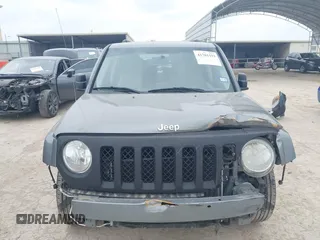 2014 Jeep Patriot Latitude with VIN 1C4NJPFAXED507693, listed as a IAAI auction lot 41701193 with 104,130 mi miles and . Bid and sale history available at DreamBid. Image 12.