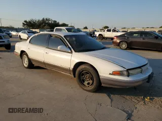 1994 Chrysler LHS z VIN 2C3ED56F7RH682200, wystawiony jako Copart lot #75204544 z przebiegiem 90 694 mil mil oraz Tytuł czysty. Historia ofert i sprzedaży dostępna na DreamBid. Obrazek 4.