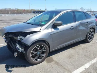 2012 Ford Focus SE with VIN 1FAHP3F25CL335319, listed as a IAAI auction lot 42079047 with 173,443 mi miles. Bid and sale history available at carsss.com. Image 2.