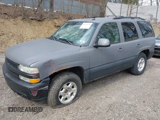 2003 Chevrolet Tahoe LS with VIN 1GNEK13Z13J287628, listed as a IAAI auction lot 42145379 with 141,957 mi miles and . Bid and sale history available at DreamBid. Image 2.