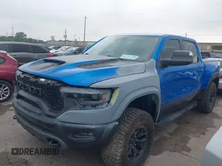 2021 Ram 1500 TRX with VIN 1C6SRFU91MN790158, listed as a IAAI auction lot 42115253 with 30,969 mi miles and . Bid and sale history available at DreamBid. Image 2.