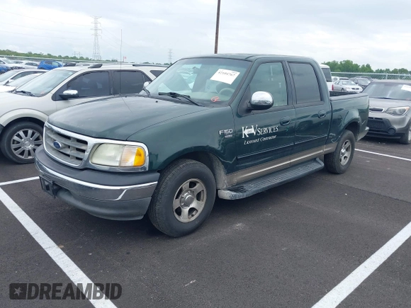 2002 Ford F-150 XLT with VIN 1FTRW07L82KB04538, listed as a IAAI auction lot 42104767 with Not Provided miles and . Bid and sale history available at DreamBid. Image 2.