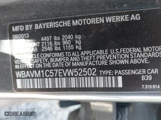 2014 BMW X1 sDrive28i with VIN WBAVM1C57EVW52502, listed as a IAAI auction lot 41702746 with 165,089 mi miles. Bid and sale history available at carsss.com. Image 9.