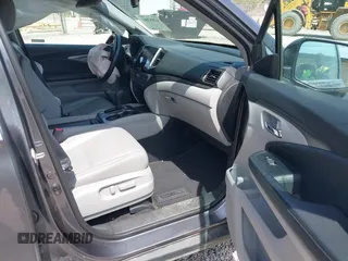 2018 Honda Pilot EX-L with VIN 5FNYF6H52JB066721, listed as a IAAI auction lot 42052842 with 134,393 mi miles and . Bid and sale history available at DreamBid. Image 5.