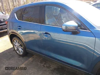 2020 Mazda CX-5 Grand Touring with VIN JM3KFBDM9L0756826, listed as a IAAI auction lot 41866290 with 145,567 mi miles. Bid and sale history available at carsss.com. Image 13.