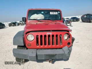 2009 Jeep Wrangler X with VIN 1J4FA24189L776078, listed as a Copart auction lot 57902705 with 104,994 mi miles and Salvage title. Bid and sale history available at DreamBid. Image 5.