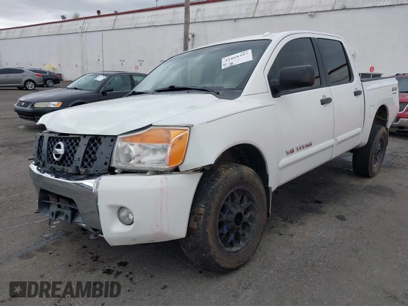 2013 Nissan Titan PRO-4X with VIN 1N6BA0EC9DN301669, listed as a IAAI auction lot 41868397 with 171,085 mi miles. Bid and sale history available at carsss.com. Image 18.