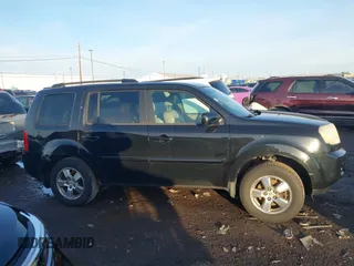 2009 Honda Pilot EX-L with VIN 5FNYF48659B012032, listed as a IAAI auction lot 41801232 with 205,636 mi miles and . Bid and sale history available at carsss.com. Image 13.