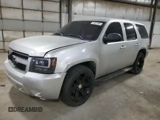 2010 Chevrolet Tahoe LS with VIN 1GNMCAE01AR223157, listed as a Copart auction lot 51087465 with 189,558 mi miles and Salvage title. Bid and sale history available at DreamBid. Image 1.