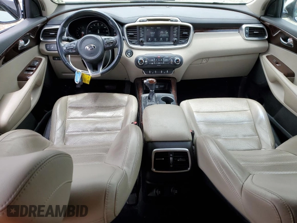 2017 Kia Sorento EX z VIN 5XYPH4A57HG301802, wystawiony jako Copart lot #55183885 z przebiegiem 128 064 mil mil oraz Szkoda całkowita • Salvage title. Historia ofert i sprzedaży dostępna na DreamBid. Obrazek 8.