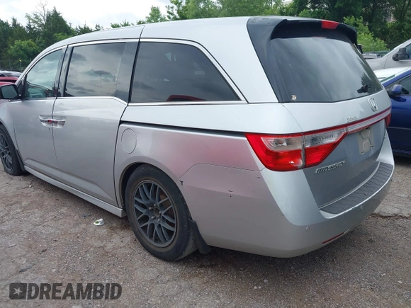 2011 Honda Odyssey Touring with VIN 5FNRL5H93BB071518, listed as a IAAI auction lot 42402421 with 227,647 mi miles and . Bid and sale history available at DreamBid. Image 3.