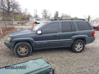 2003 Jeep Grand Cherokee Laredo with VIN 1J4GX48SX3C604904, listed as a IAAI auction lot 40884443 with 188,352 mi miles. Bid and sale history available at carsss.com. Image 14.