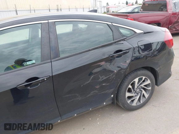 2018 Honda Civic EX with VIN 2HGFC2F75JH583892, listed as a IAAI auction lot 41697605 with 134,675 mi miles and . Bid and sale history available at DreamBid. Image 6.