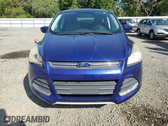 2014 Ford Escape SE z VIN 1FMCU0GX1EUB39764, wystawiony jako Copart lot #56888625 z przebiegiem 120 382 mil mil oraz Czysty tytuł • Clean title. Historia ofert i sprzedaży dostępna na DreamBid. Obrazek 5.