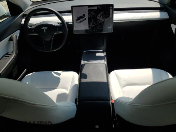 2022 Tesla Model Y Long Range z VIN 7SAYGDEE1NF354633, wystawiony jako Copart lot #55221835 z przebiegiem 53 821 mil mil oraz Szkoda całkowita • Salvage title. Historia ofert i sprzedaży dostępna na DreamBid. Obrazek 8.