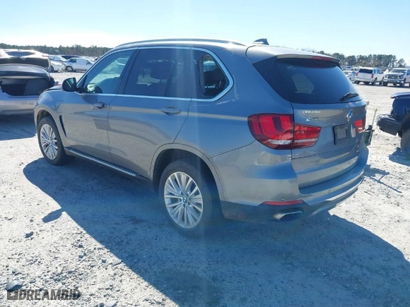 2016 BMW X5 eDrive xDrive40e with VIN 5UXKT0C50G0F75010, listed as a IAAI auction lot 41732410 with 88,671 mi miles. Bid and sale history available at carsss.com. Image 3.