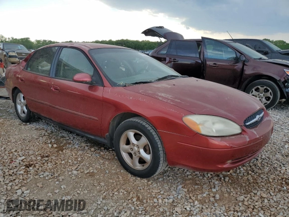 2000 Ford Taurus SES with VIN 1FAFP55U1YA262488, listed as a Copart auction lot 52312645 with 128,621 mi miles and Salvage Title. Bid and sale history available at DreamBid. Image 4.