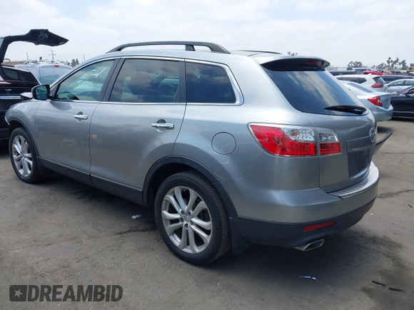 2011 Mazda CX-9 Grand Touring z VIN JM3TB2DA5B0319538, wystawiony jako IAAI lot #42429157 z przebiegiem 88 321 mil mil oraz . Historia ofert i sprzedaży dostępna na DreamBid. Obrazek 3.