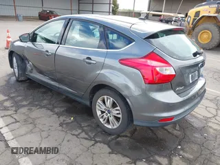2012 Ford Focus SEL with VIN 1FAHP3M29CL314685, listed as a IAAI auction lot 41974881 with 167,119 mi miles. Bid and sale history available at carsss.com. Image 3.