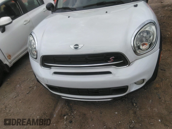 2015 MINI Cooper Countryman S with VIN WMWZC5C51FWP48214, listed as a IAAI auction lot 42102174 with 181,917 mi miles. Bid and sale history available at carsss.com. Image 6.