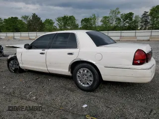 2003 Mercury Grand Marquis GS Convenience z VIN 2MEFM74WX3X633910, wystawiony jako Copart lot #52999865 z przebiegiem 207 970 mil mil oraz Szkoda całkowita • Salvage title. Historia ofert i sprzedaży dostępna na DreamBid. Obrazek 2.