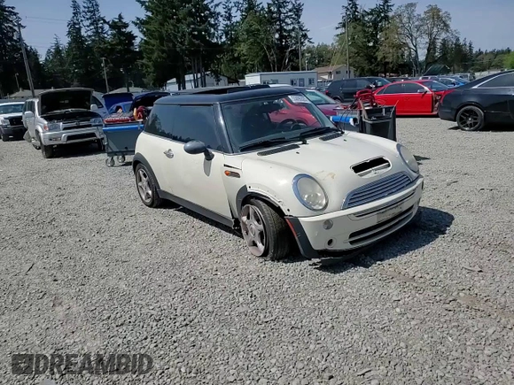 2006 MINI Hardtop with VIN WMWRC33586TJ77908, listed as a Copart auction lot 55095525 with 143,810 mi miles and Salvage title. Bid and sale history available at DreamBid. Image 13.