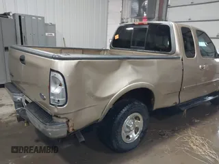 1999 Ford F-150 with VIN 1FTRX18W0XKA68363, listed as a IAAI auction lot 41524104 with 218,400 mi miles and . Bid and sale history available at DreamBid. Image 6.