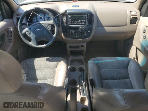 2002 Ford Escape XLS Choice with VIN 1FMYU02112KB00947, listed as a Copart auction lot 48948855 with 223,287 mi miles and Salvage title. Bid and sale history available at DreamBid. Image 8.
