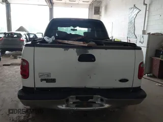 2003 Ford F-150 XLT with VIN 1FTRW08L03KB51627, listed as a IAAI auction lot 42497227 with 330,207 mi miles and . Bid and sale history available at DreamBid. Image 16.
