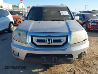 2011 Honda Pilot EX-L with VIN 5FNYF3H68BB020464, listed as a IAAI auction lot 41259261 with 223,069 mi miles and . Bid and sale history available at DreamBid. Image 12.