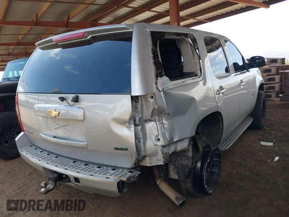 2011 Chevrolet Tahoe LS with VIN 1GNSCAE02BR181767, listed as a IAAI auction lot 42078569 with 212,857 mi miles and . Bid and sale history available at DreamBid. Image 4.