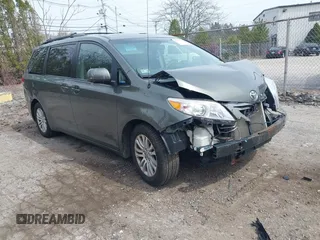 2012 Toyota Sienna XLE AAS with VIN 5TDYK3DC1CS199113, listed as a IAAI auction lot 42123757 with 211,723 mi miles and . Bid and sale history available at carsss.com. Image 1.