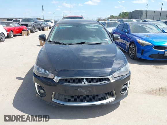 2016 Mitsubishi Lancer GT with VIN JA32U8FW8GU011501, listed as a IAAI auction lot 41779016 with 153,082 mi miles. Bid and sale history available at carsss.com. Image 12.