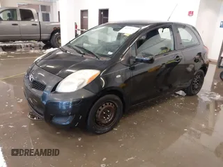2011 Toyota Yaris with VIN JTDJT4K3XB5327229, listed as a IAAI auction lot 41275717 with 140,276 mi miles. Bid and sale history available at carsss.com. Image 18.