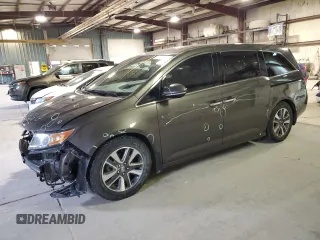 2016 Honda Odyssey Touring Elite с VIN 5FNRL5H99GB053600, выставлен на аукционе Copart как лот 55092595 с пробегом 145 931 миль миль и Списание • Salvage title. История ставок и продаж доступна на DreamBid. Изображение 1.