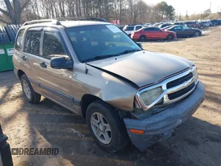 2003 Chevrolet Tracker z VIN 2CNBJ13C236928160, wystawiony jako IAAI lot #41976835 z przebiegiem 73 708 mil mil oraz . Historia ofert i sprzedaży dostępna na DreamBid. Obrazek 1.
